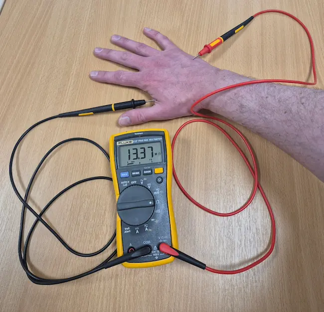 Human hand showing a measured resistance of 1.3 × 10 to the 7 ohms within a Type C FIBC object recognition window